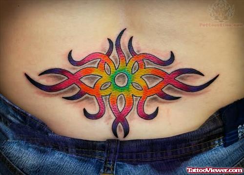 Awesome Color Tribal Tattoo On Lowerback