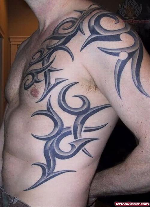 Tribal Tattoo On Shoulder And Chest For Men