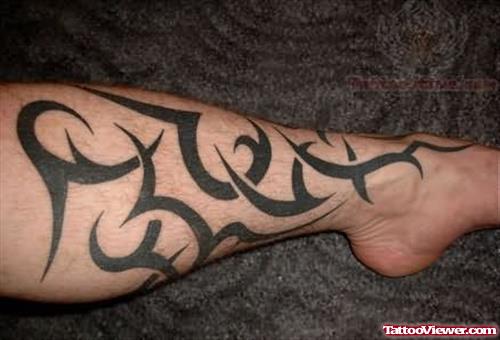 Tribal Tattoo On Left Leg