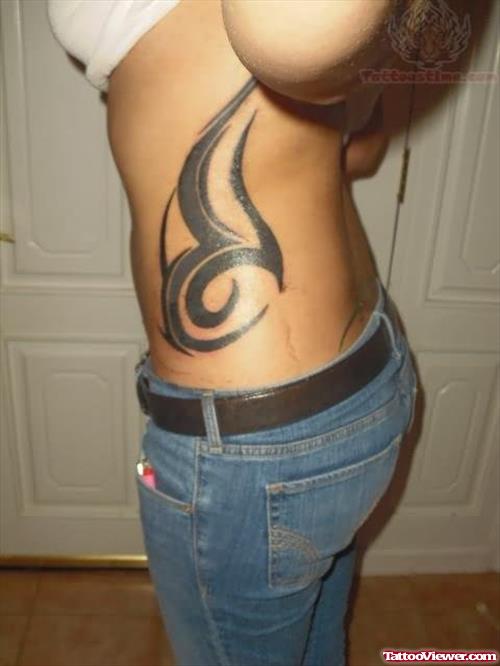 Side Rib Tribal Tattoo For Girls