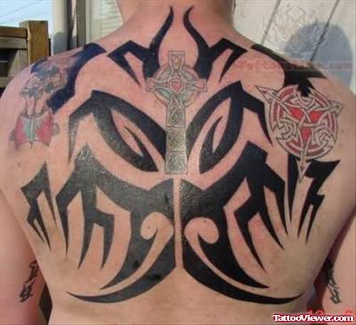 Large Tribal Tattoo On Upperback