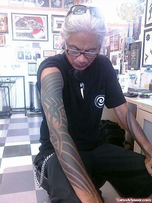 Grey ink Tribal Tattoo On Right Sleeve