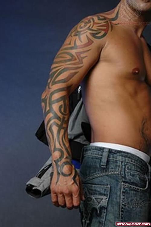 Tribal Tattoo On Right Sleeve