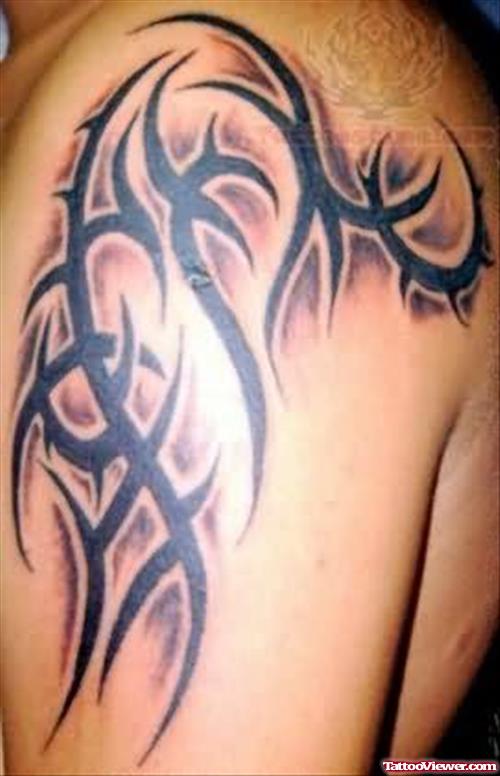 Tribal Tattoo On Left Shoulder For Men