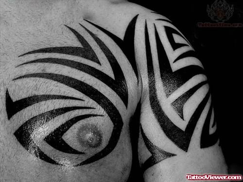 Tribal Tattoo On Chest And Bicep