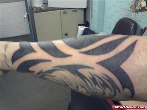 Tribal Bold Tattoo On Sleeve