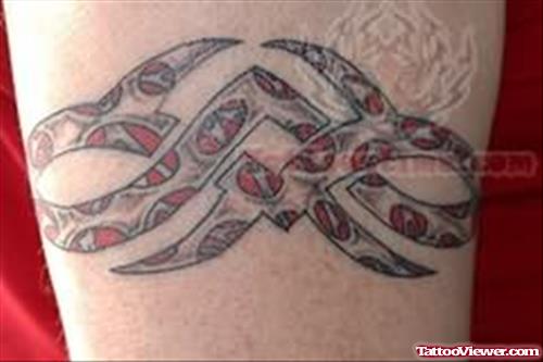 Red And Black Tribal Tattoo