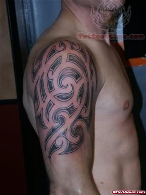 Tribal Tattoo On Right Shoulder