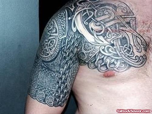 Beautiful Tribal Tattoo On Right Shoulder