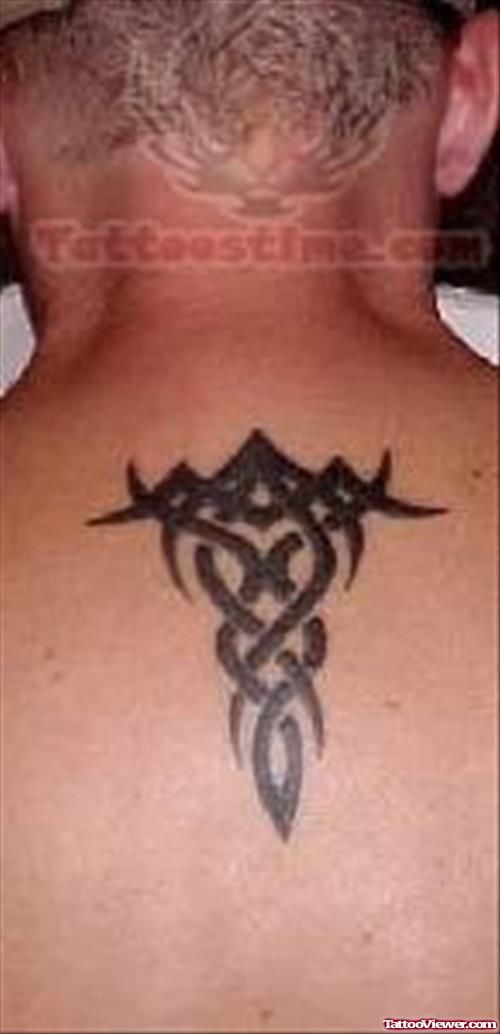 Small Black Tribal Tattoo On Back