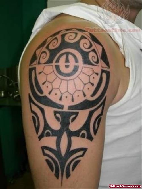 Nice Tribal Tattoo On Biceps