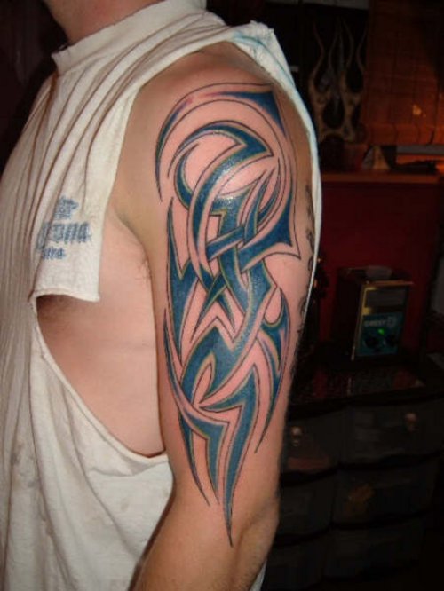 Awesome Left Shoulder Tribal Tattoo For Men