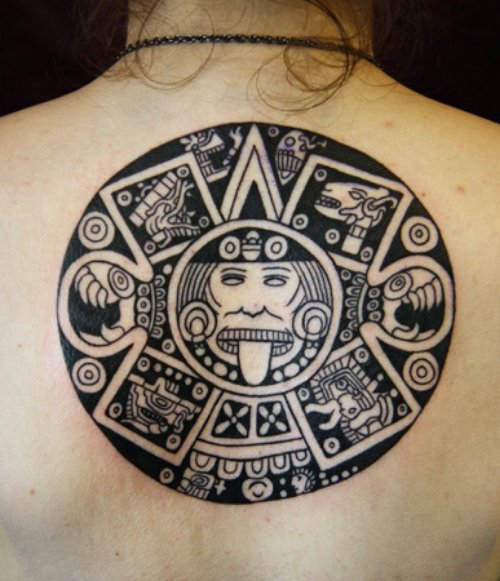 Maori Tribal Tattoo On Man Upperback