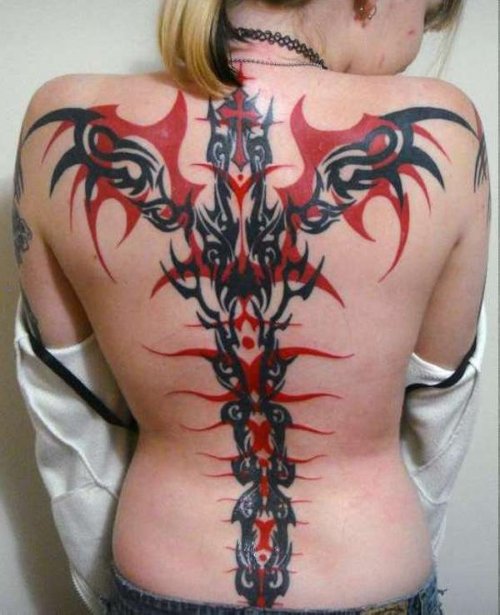 Red And Black Ink Tribal Tattoo On Girl Full Back