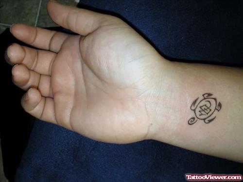 Tiny Tribal Turtle Tattoo