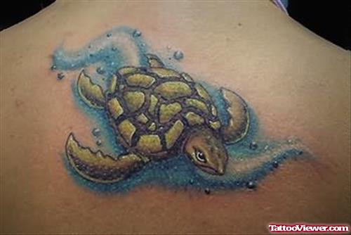 Water And Turtle Tattoo On Back