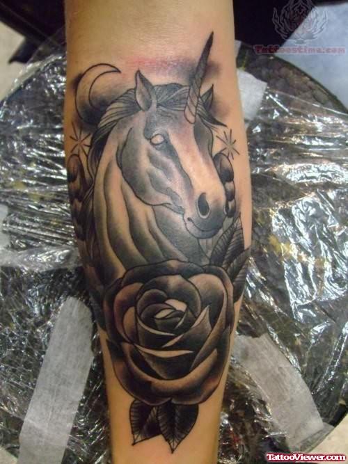 Black Ink Unicorn Tattoo On Arm