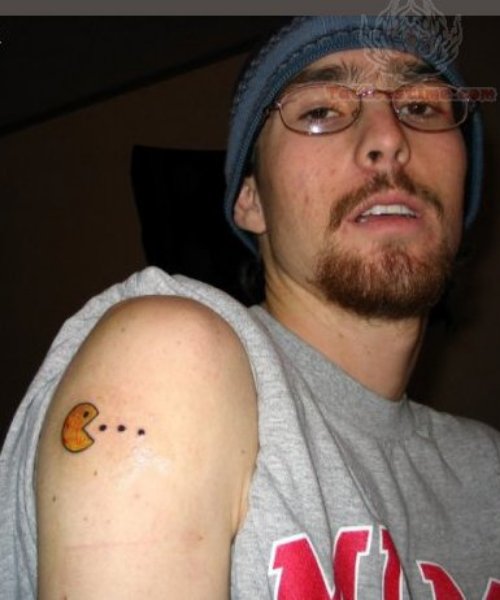 Pacman Tattoo On Bicep