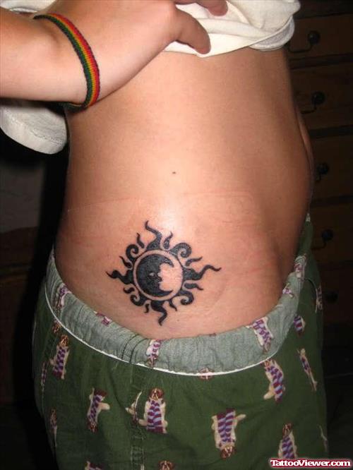 Sun And Moon Tattoo On Waist