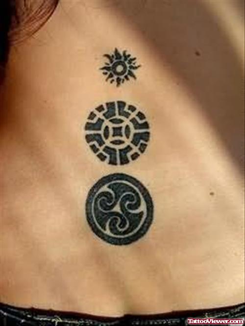 Symbol Tattoo On Back Waist