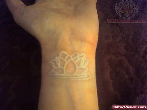 White Ink Lotus Flower Tattoo on Wrist