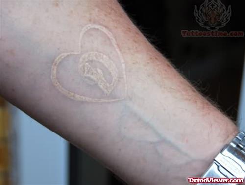 White Ink Love Tattoo On Wrist