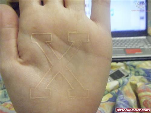 White Ink X Tattoo On Palm