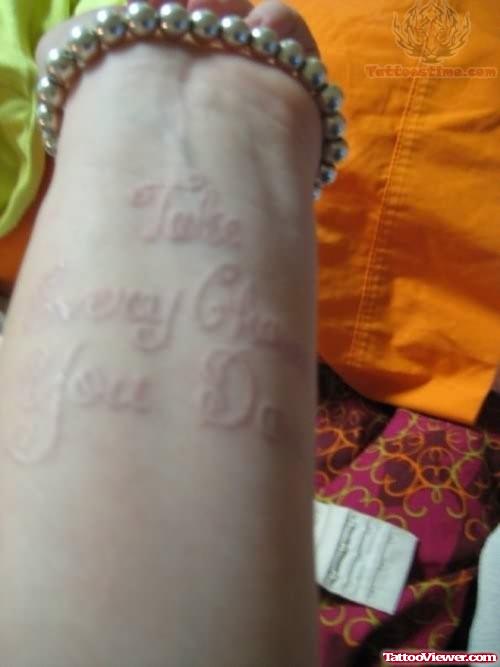 White Ink Quote Tattoo