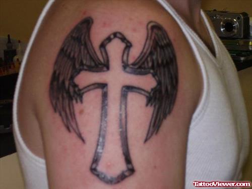 Winged Cross Tattoo On Right Shoulder