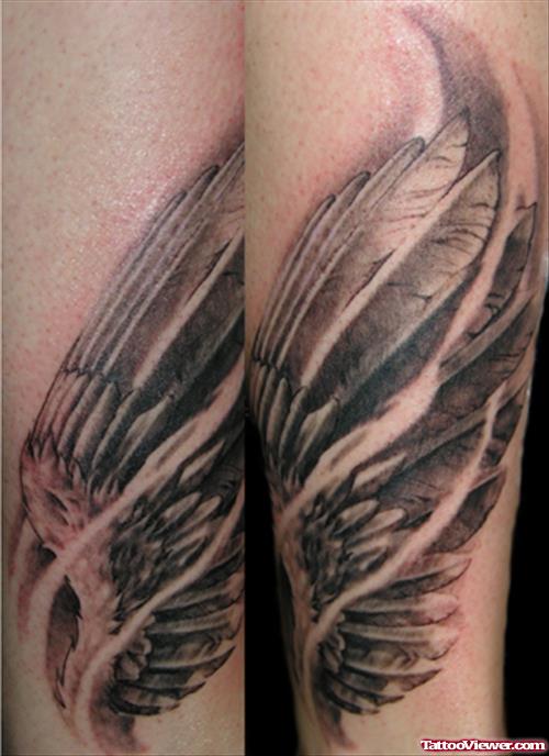 Grey Ink Wings Tattoo