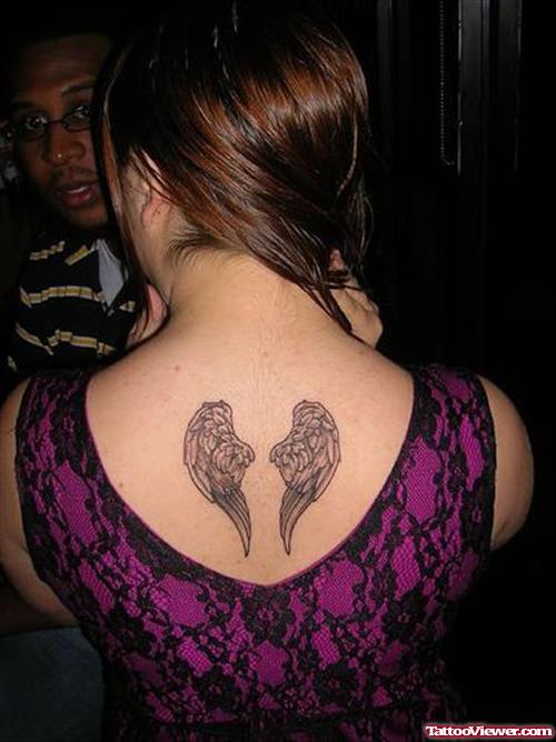 Grey Ink Small Wings Tattoo On Back