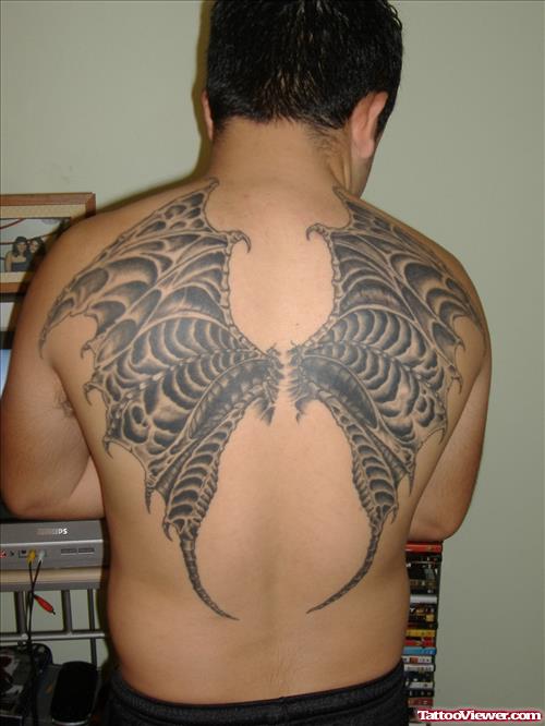 Beautiful Grey Ink Wings Tattoo On Back Body