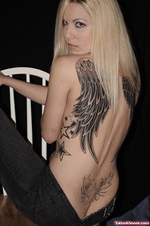 Amazing Grey Ink Wings Tattoos On Girl Back