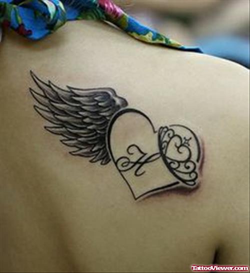 Grey Ink Heart With Angel Wing Tattoo On Right Back Shoulder