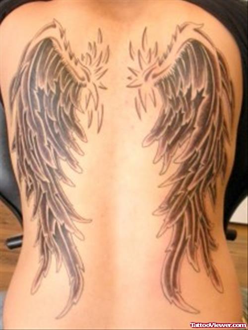 Unique Grey Ink Wings Tattoos On Back Body