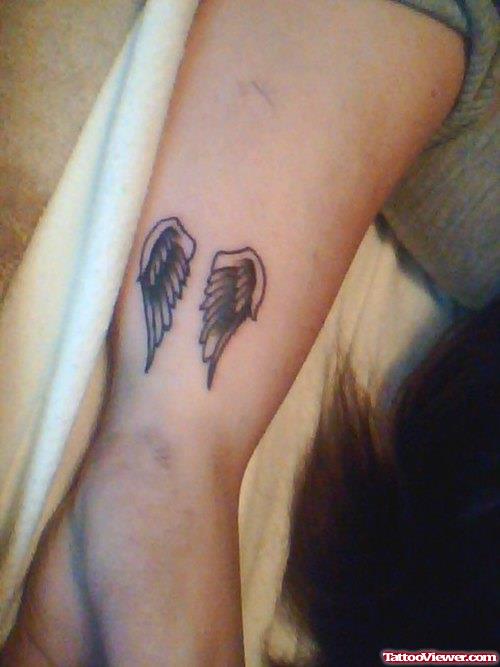 Left Wrist Angel Wings Tattoo