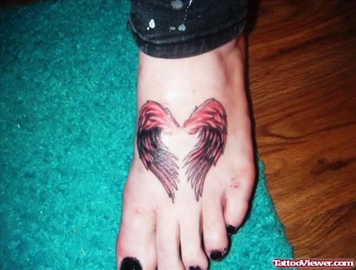 Awesome Wings Heart Tattoo On Left Foot For Girls