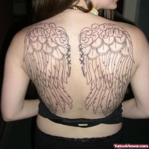 Attractive Grey Ink Wings Tattoos On Girl Back