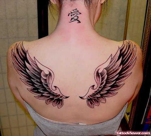 Grey Ink Wings Tattoos For Women