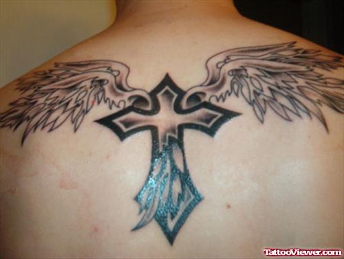 Stylish Winged Cross Tattoo On Upperback