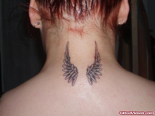 Small Wings Tattoos On Nape