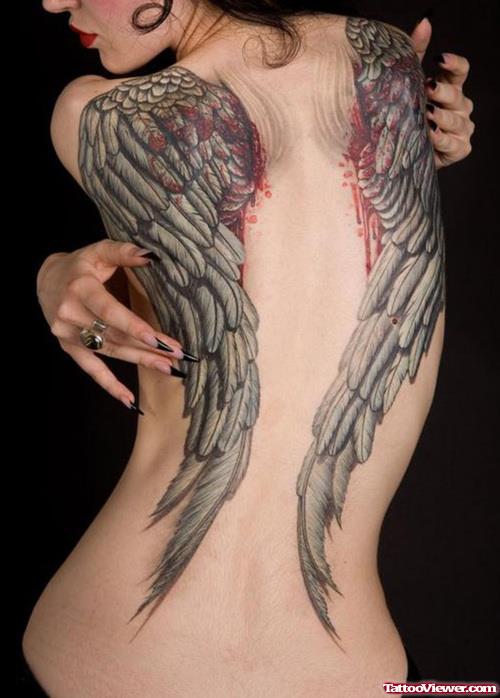 Grey Ink Bleeding Wings Tattoos On Back