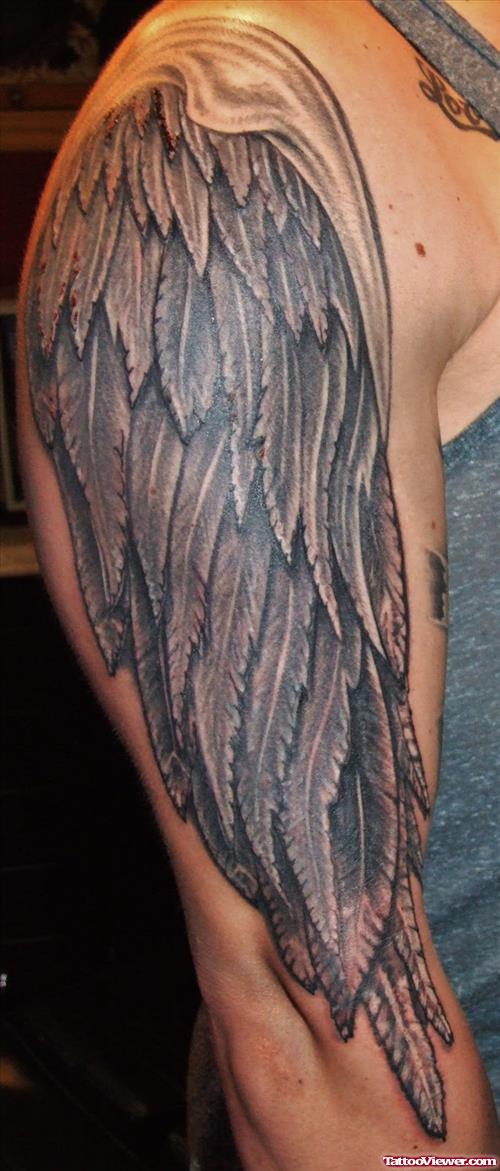 Grey Ink Angel Wings Tattoo On Right Sleeve