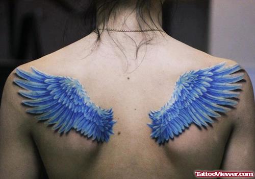 Blue ink Wings Tattoos On Upperback
