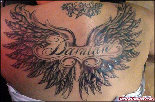 Wings Tattoo On Girl Upperback