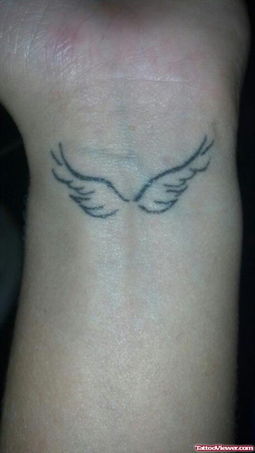 Left Wrist Angel Wings Tattoos
