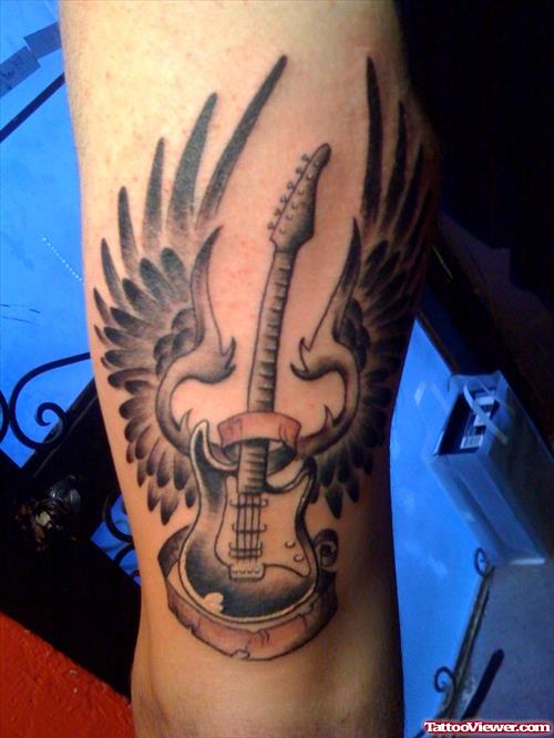 Grey Ink Guitar With Wings Tattoo