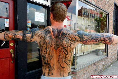 Grey Ink Wings Tattoos On Back And Sleeve
