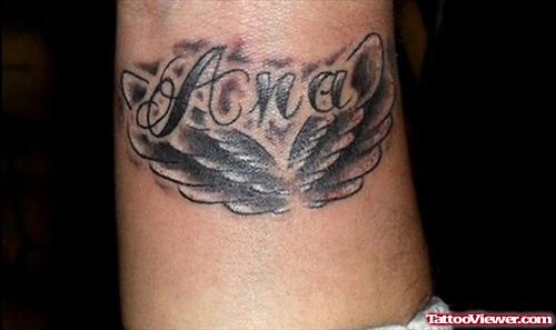 Grey Ink Wings Tattoos On Arm