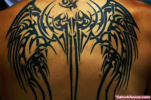 Black Tribal Cross And Wings Tattoo